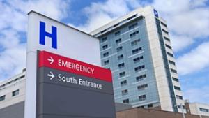 direction sign with capital letter H for hospital