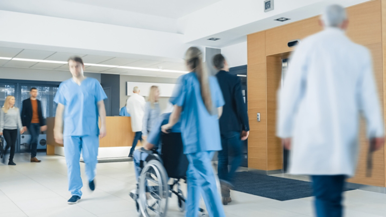 people walking hospital