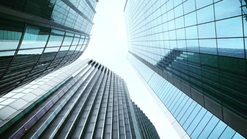 Three Buildings Looking towards bright sky