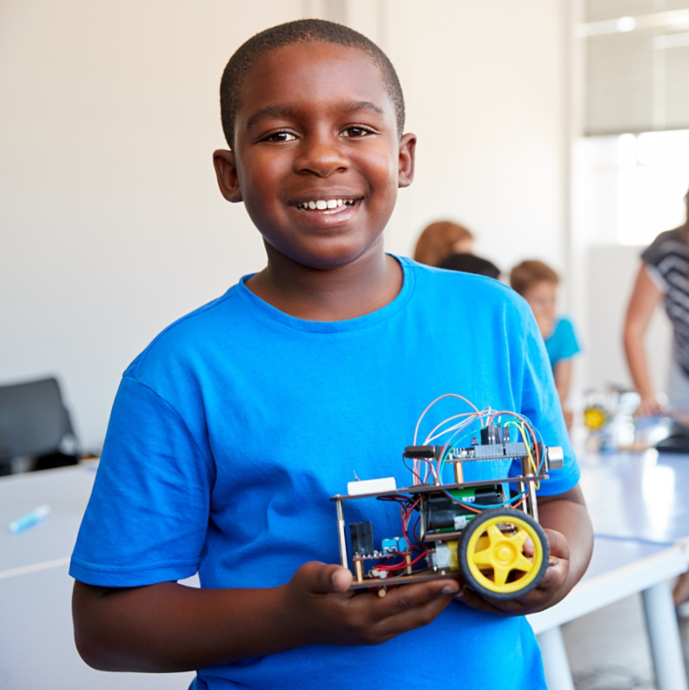 Young Student Building a Robot