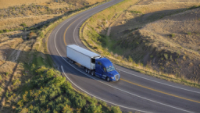 Precedent S-750i Trailer TRU Open Road Scene 4 Image