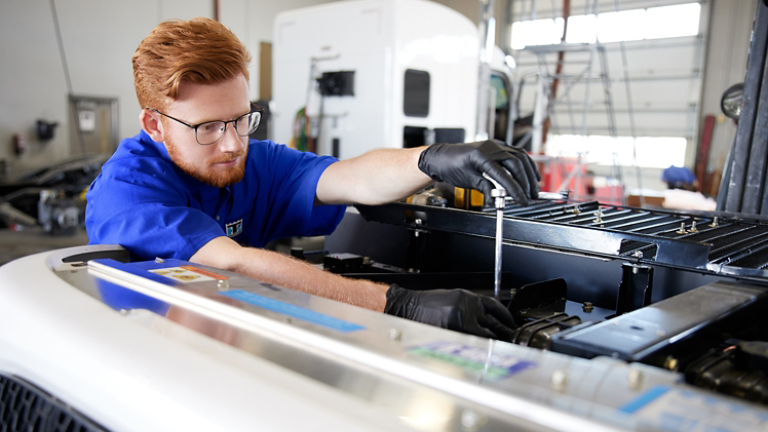 Thermo King technician checking diagnostics