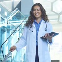 Doctor in Stairwell with Tablet