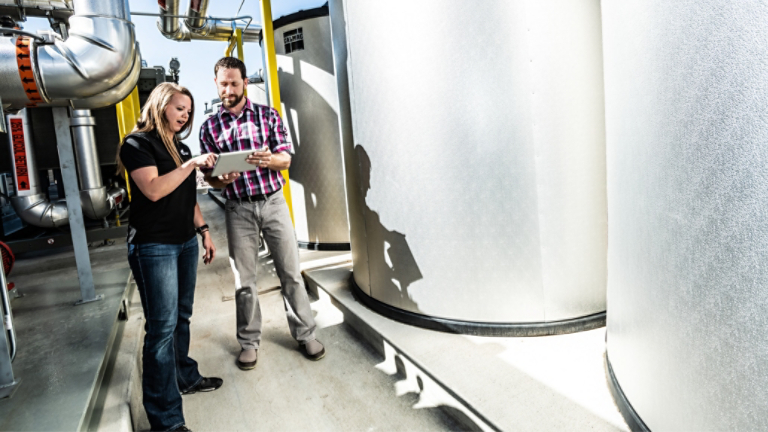 Employee with Customer in Energy Storage System