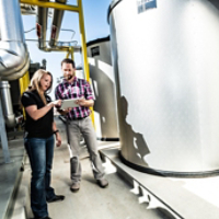 Employee with Customer in Energy Storage System