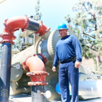 Technician in Front of Rental Unit