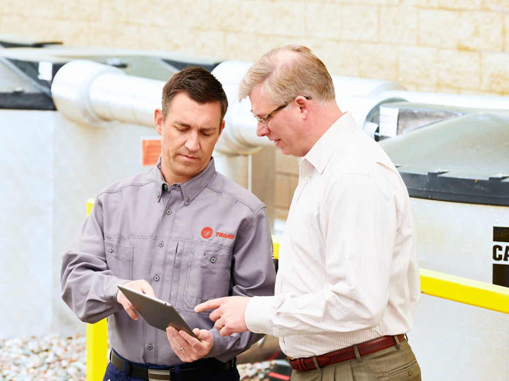 A Trane technician demonstrates Connected Mechanical Services.