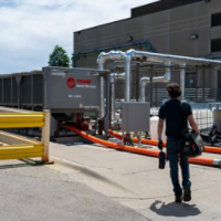 Technician walking to Work on Rental Unit