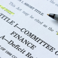 Closeup of the documents of the Inflation Reduction Act of 2022. The Unites States Senate passed the Inflation Reduction Act, the climate, tax and healthcare legislation, on Sunday, August 7, 2022.