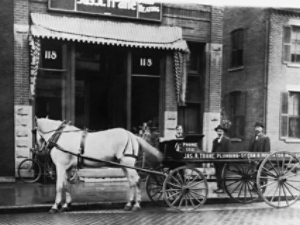 Trane Company carriage in front of building