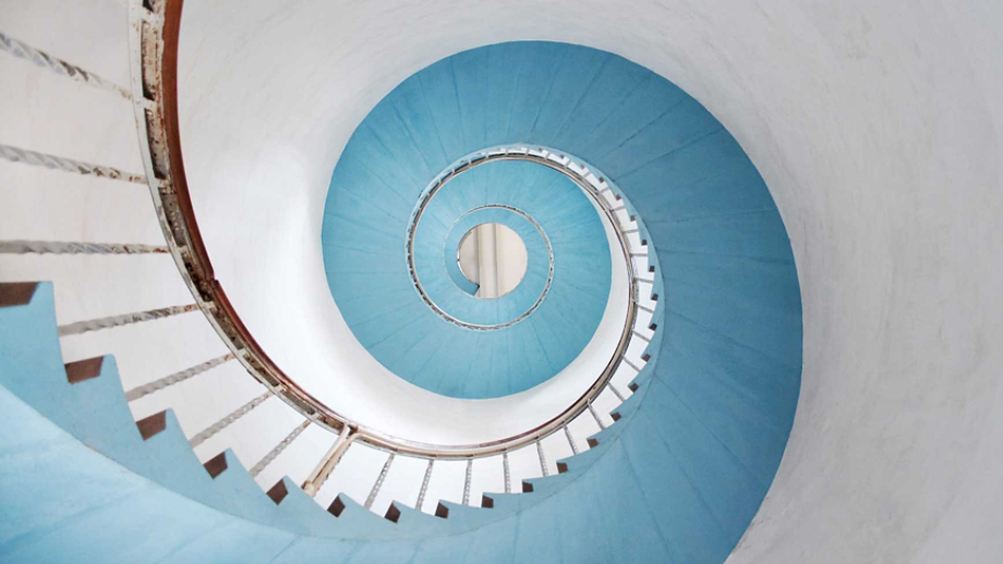 view looking up at circular staircase