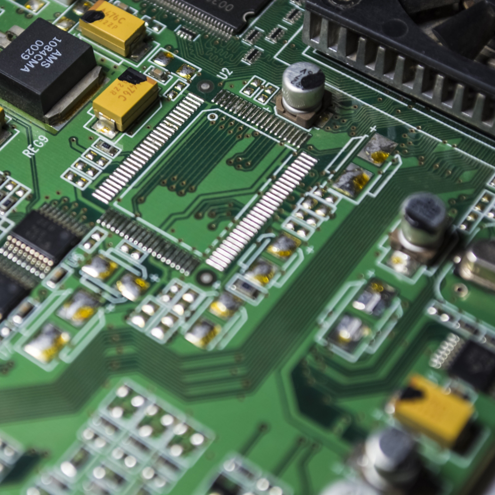 The motherboard of green color from the personal computer. Repair. Texture or background. Electronics. Spare parts. 