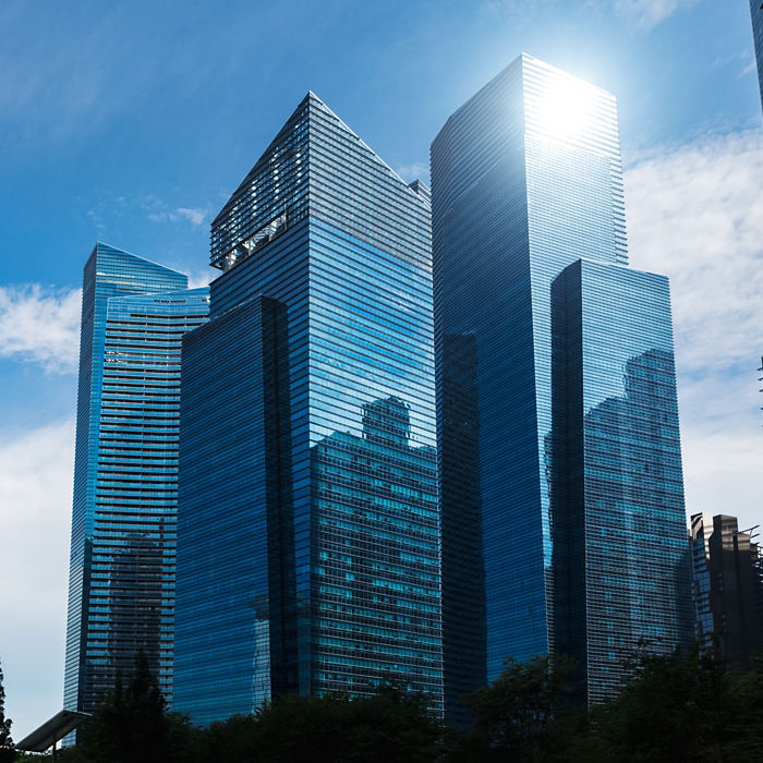 Modern blue skyscrapers at downtown district. Business landscape background. Singapore city