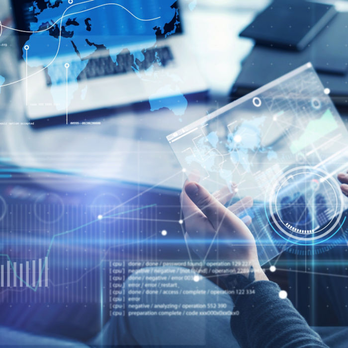 Man with futuristic digital tablet on a project