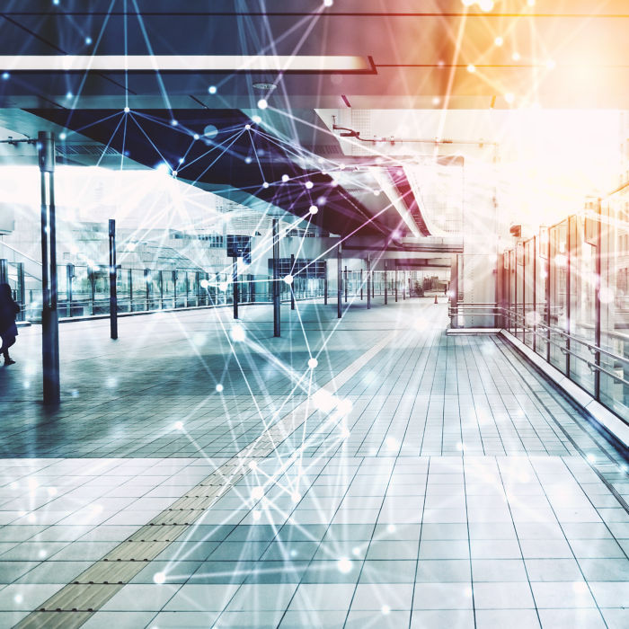 Concept of communication and technology. Modern architecture with light and network effects