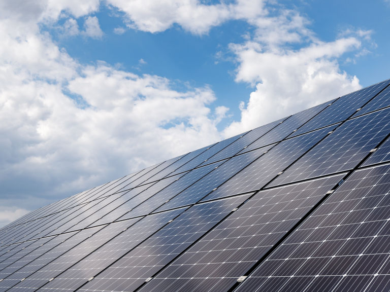 close-up view of solar panels on a background of blue sky