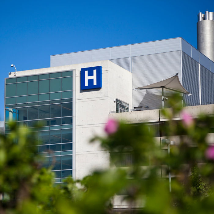 Modern hospital and sign