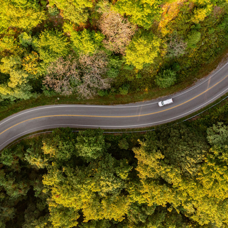Car driving on rural road