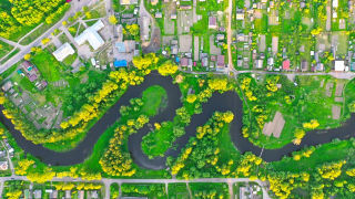 River through residential neighborhood