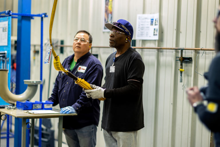 Employees operating equipment