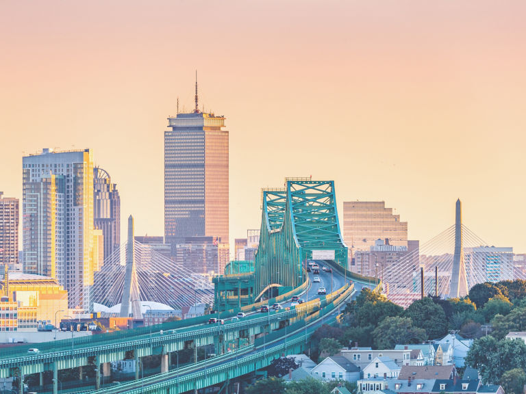 Tobin bridge, Zakim bridge and Boston skyline panorama at sunset.