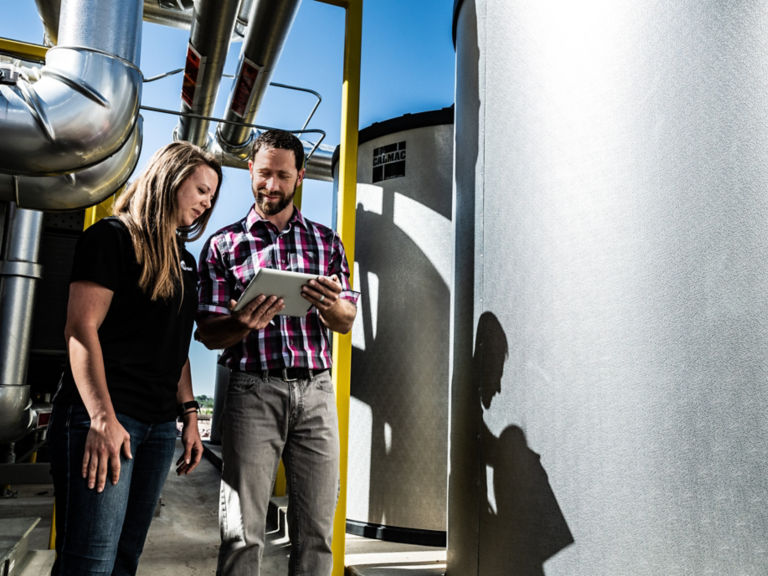 Employee with Customer in Energy Storage System