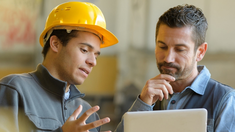 Technicians Learning on Tablet