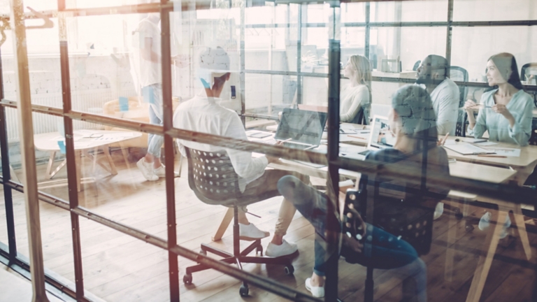 Young people work in modern office