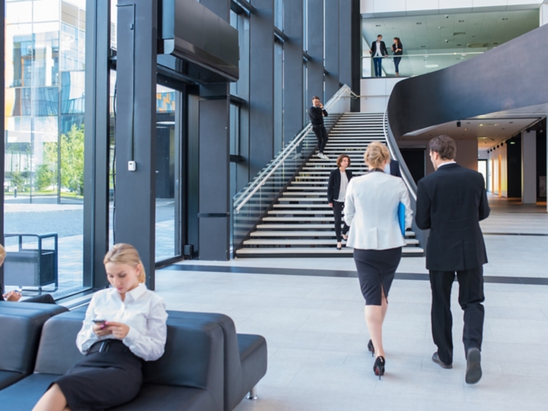 Business people at hall of office building