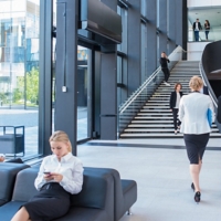 Business people at hall of office building