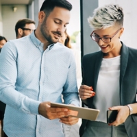 Business colleagues having conversation during coffee break