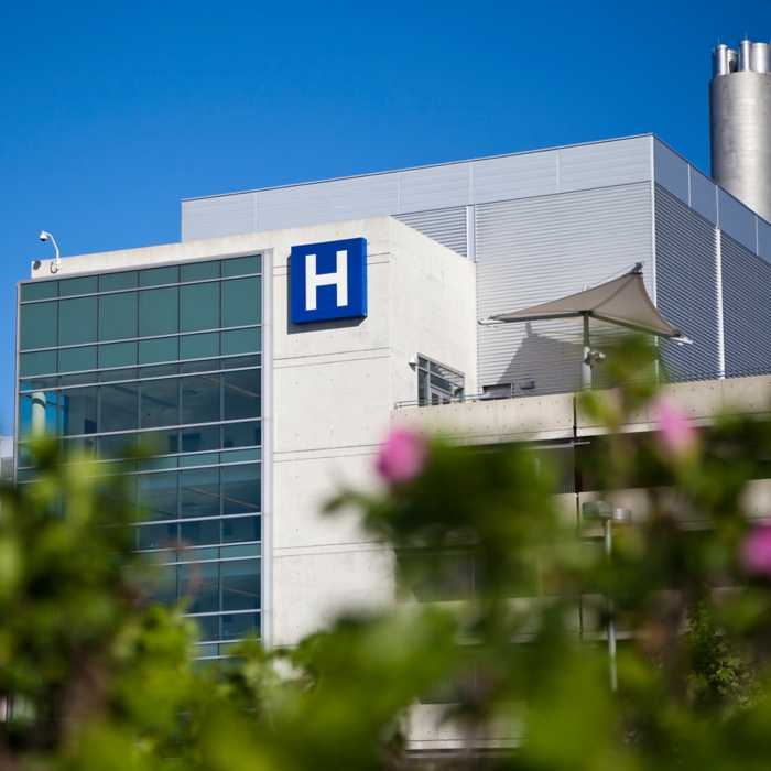 Modern hospital and sign