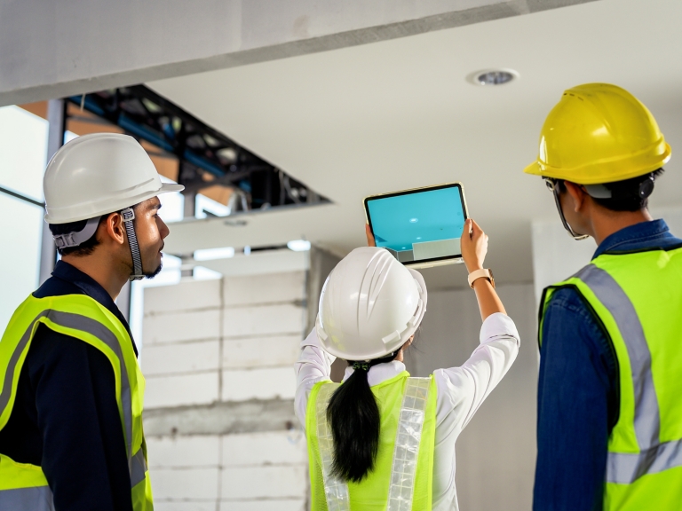 hvac technicians looking at screen