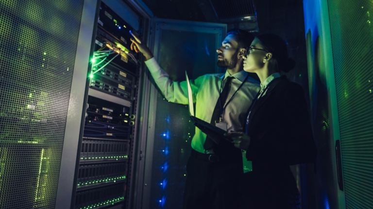Man and woman in data centre
