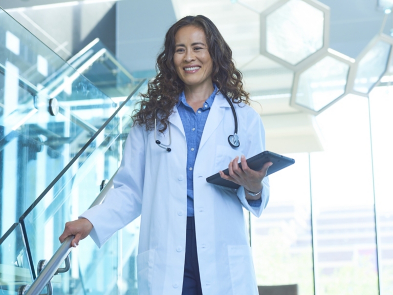Doctor in Stairwell with Tablet